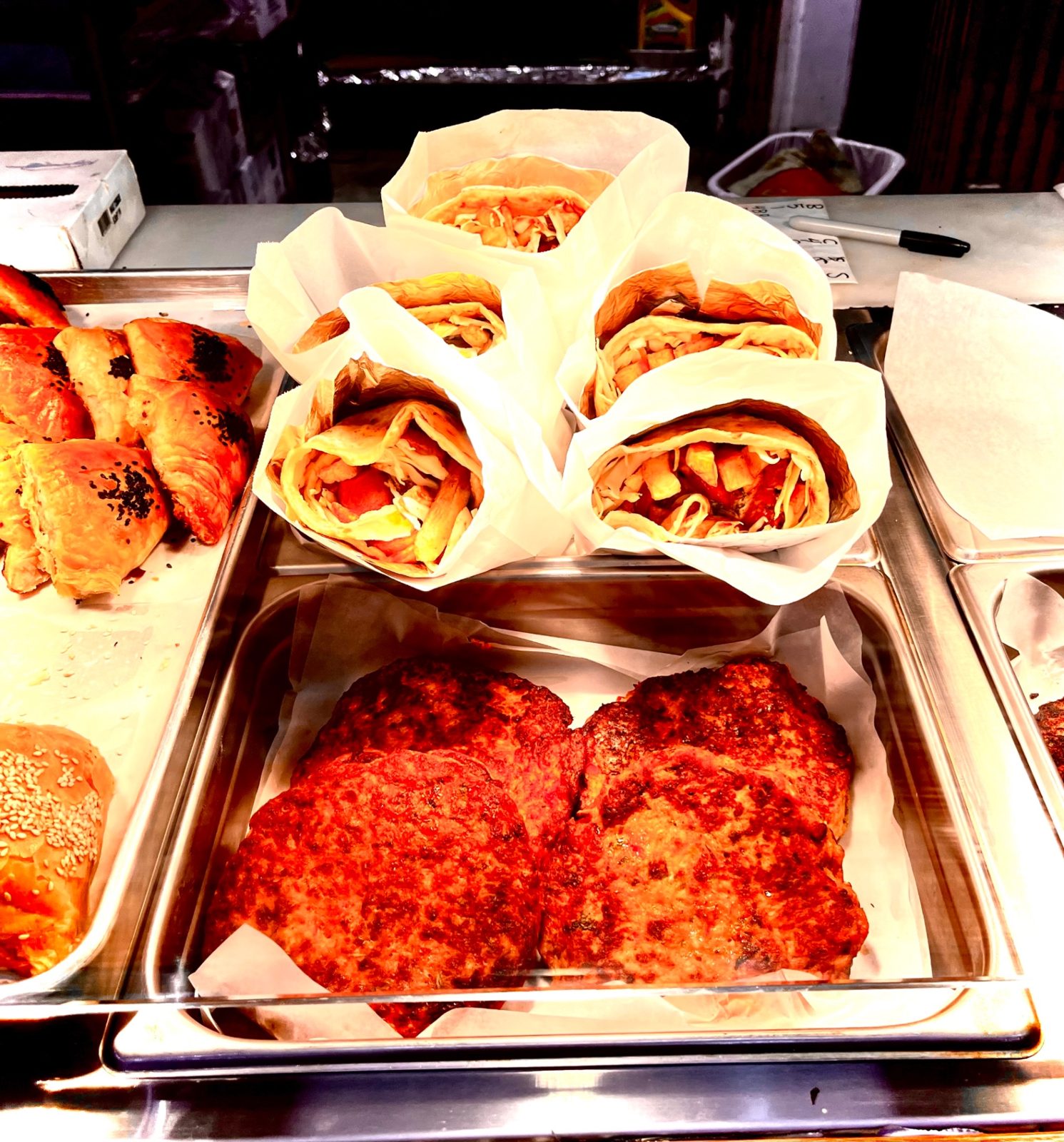 Chapli kebabs and stuffed wraps in the hot counter