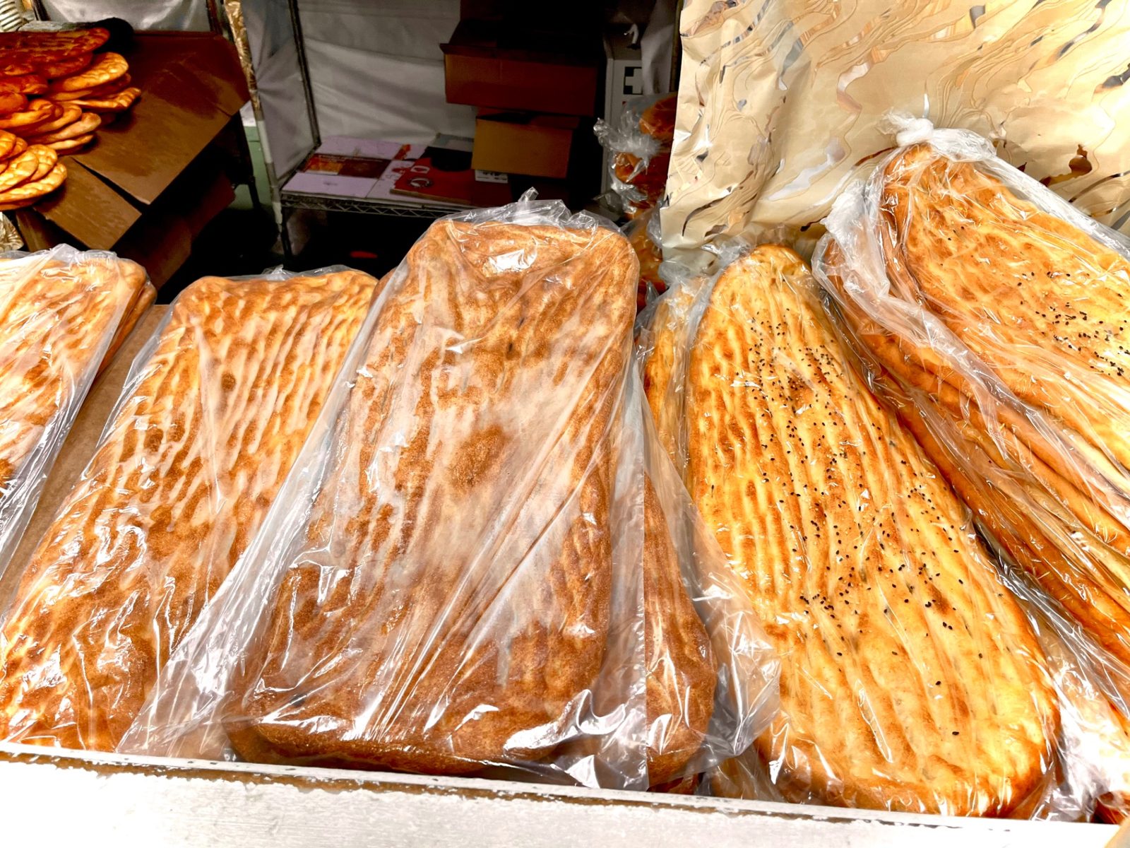 Fresh Afghan naan breads at the counter