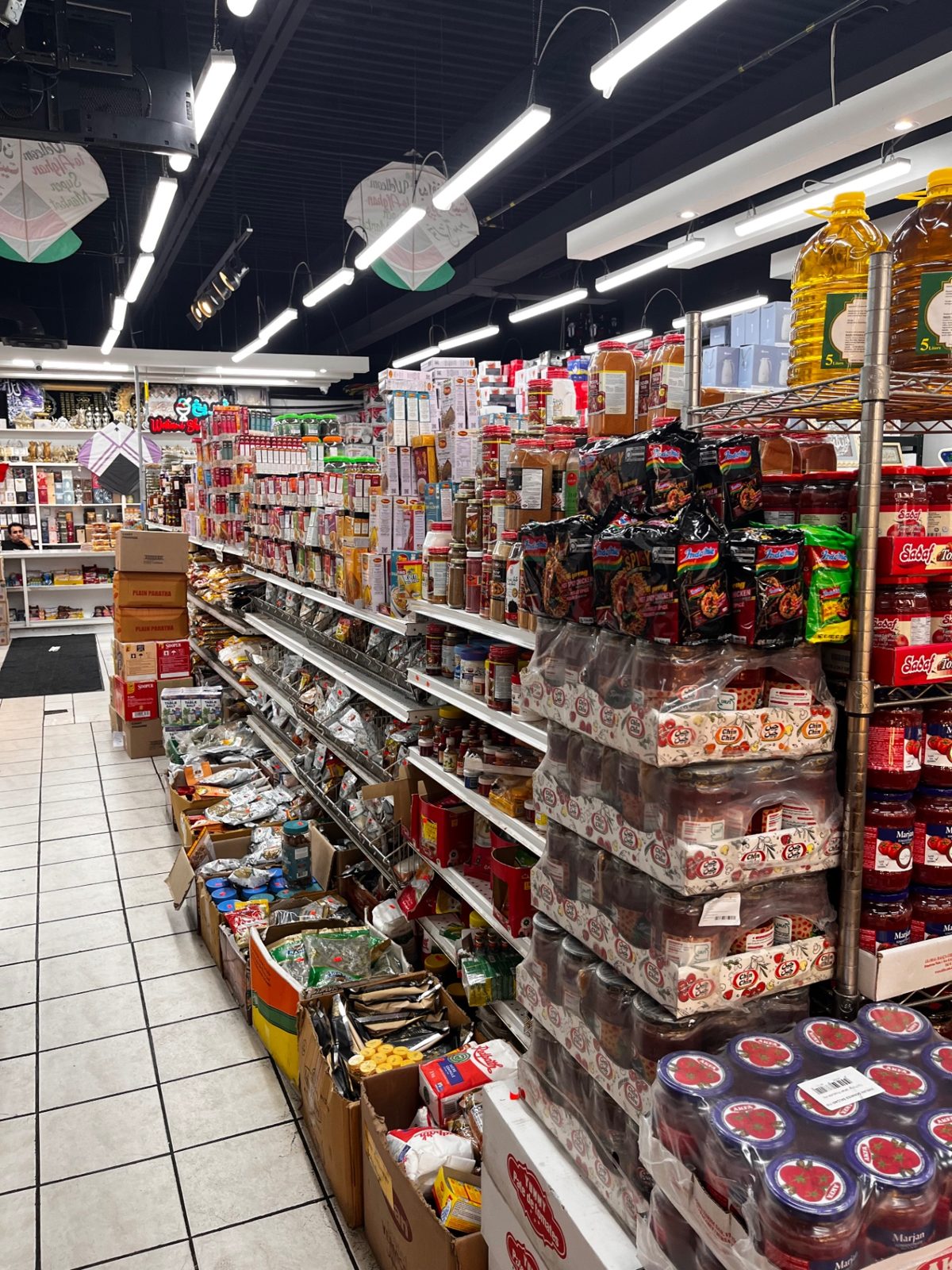 Aisle of packaged foods, oils and beverages